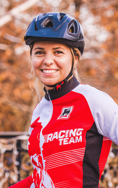 Mega Image colleague smiling in biking gear